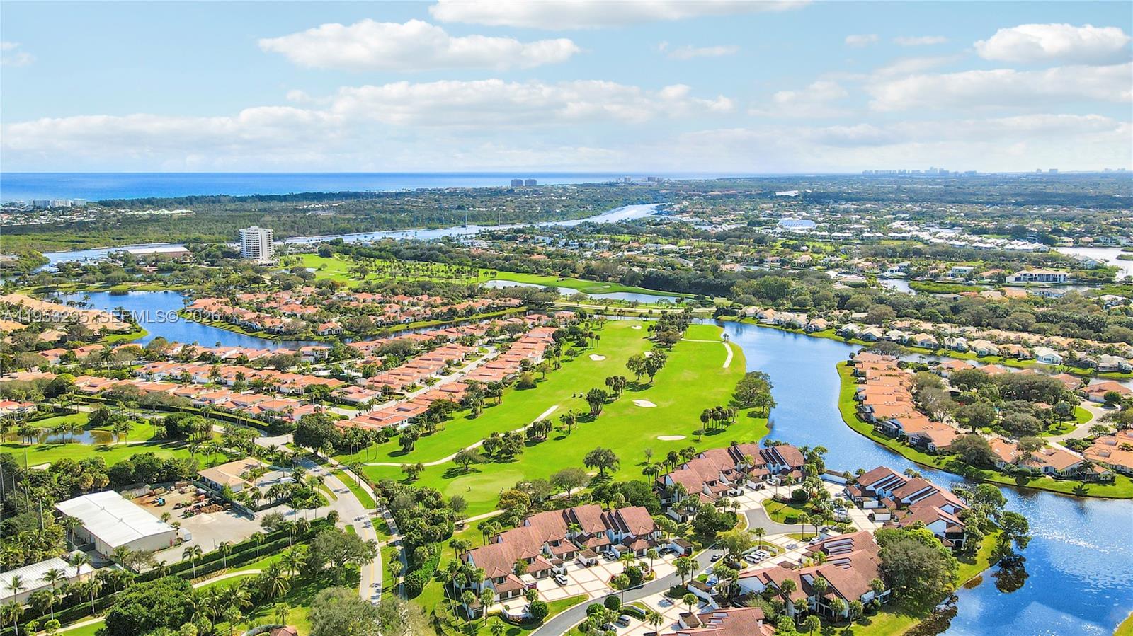 16600 Traders Crossing South, Unit 253 Jupiter, FL 33477 - Photo 12 of 67 view of city and ocean