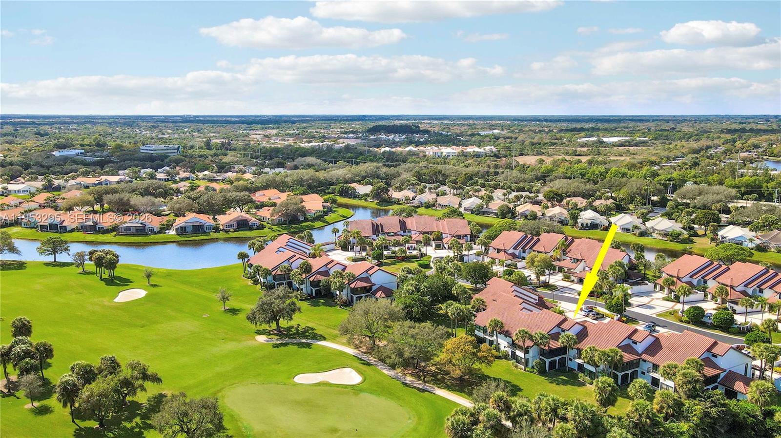 16600 Traders Crossing South, Unit 253 Jupiter, FL 33477 - Photo 17 of 67 an aerial view of residential houses with outdoor space