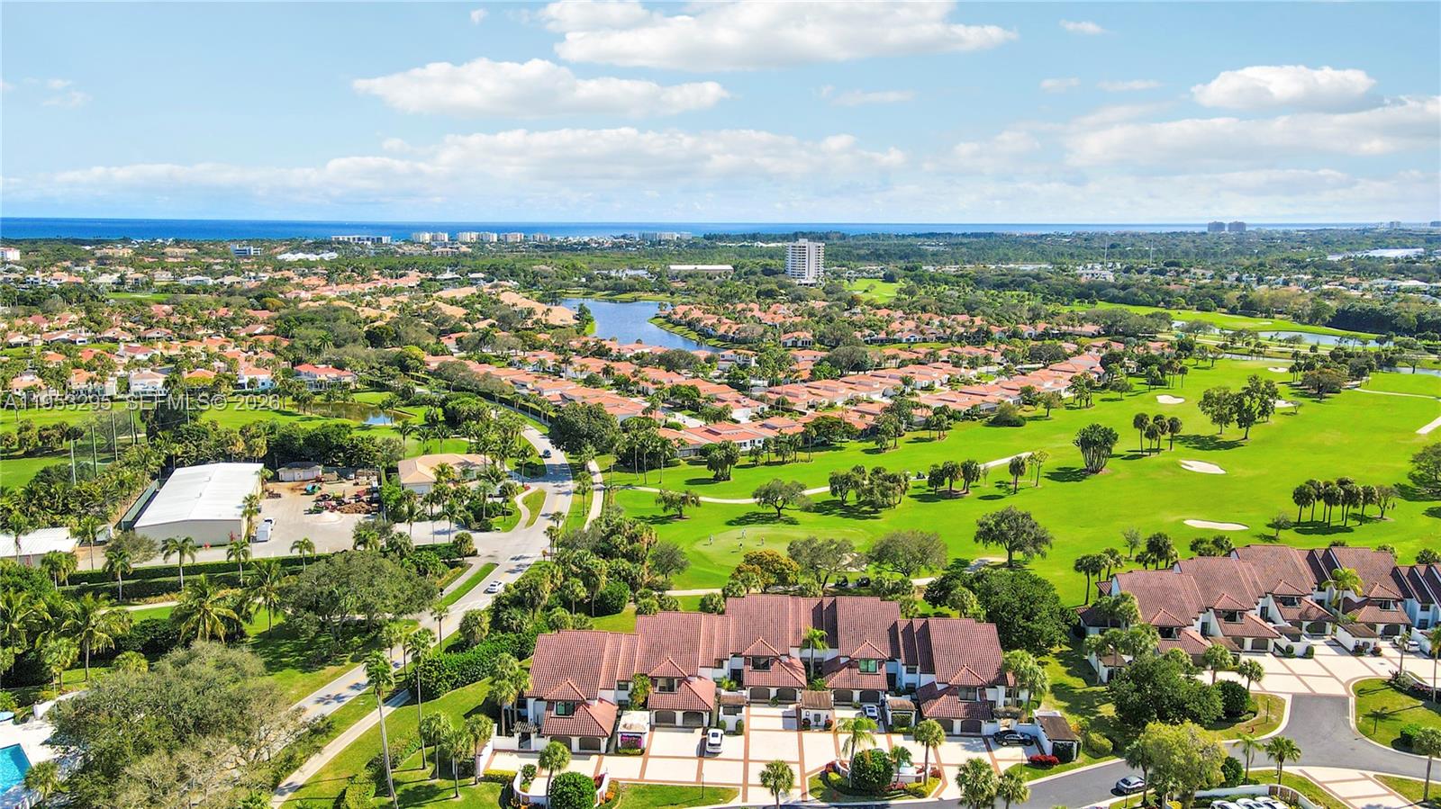 16600 Traders Crossing South, Unit 253 Jupiter, FL 33477 - Photo 6 of 67 an aerial view of multiple house
