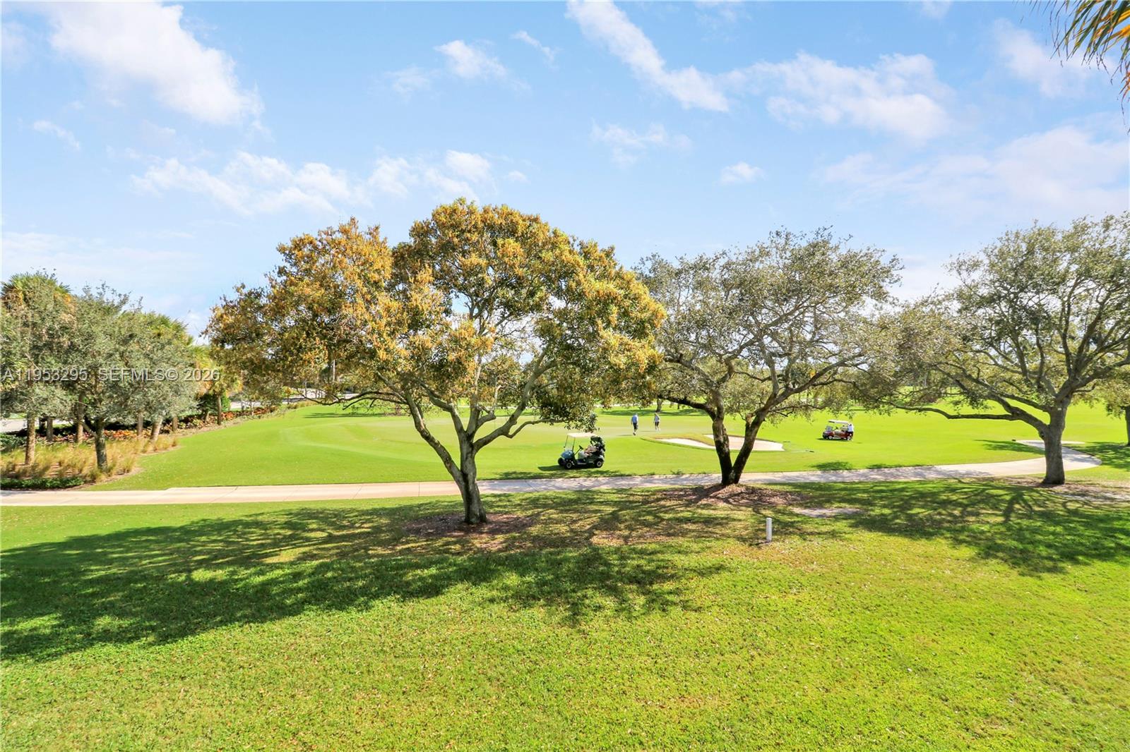16600 Traders Crossing South, Unit 253 Jupiter, FL 33477 - Photo 62 of 67 a view of yard with swimming pool