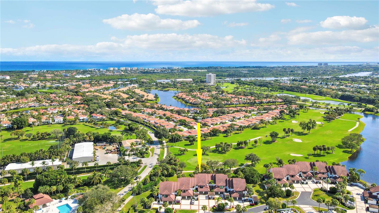 16600 Traders Crossing South, Unit 253 Jupiter, FL 33477 - Photo 7 of 67 an aerial view of residential houses with outdoor space and trees