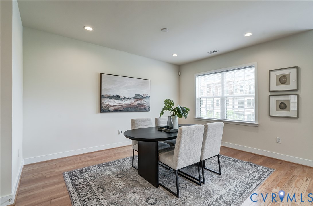 2006 Libbie Lake W Street, Unit B Richmond, VA 23230 - Photo 16 of 43 a dining room with furniture and window