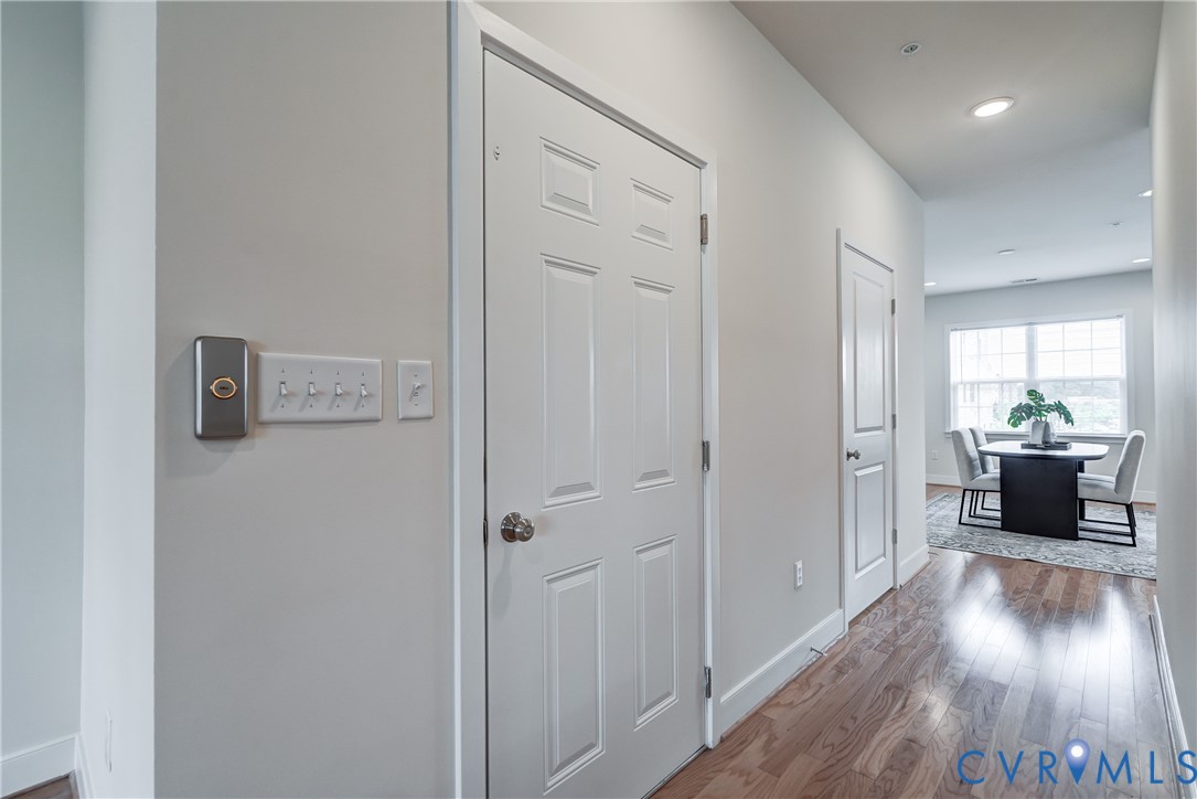 2006 Libbie Lake W Street, Unit B Richmond, VA 23230 - Photo 22 of 43 a view of a hallway view with wooden floor and a living room