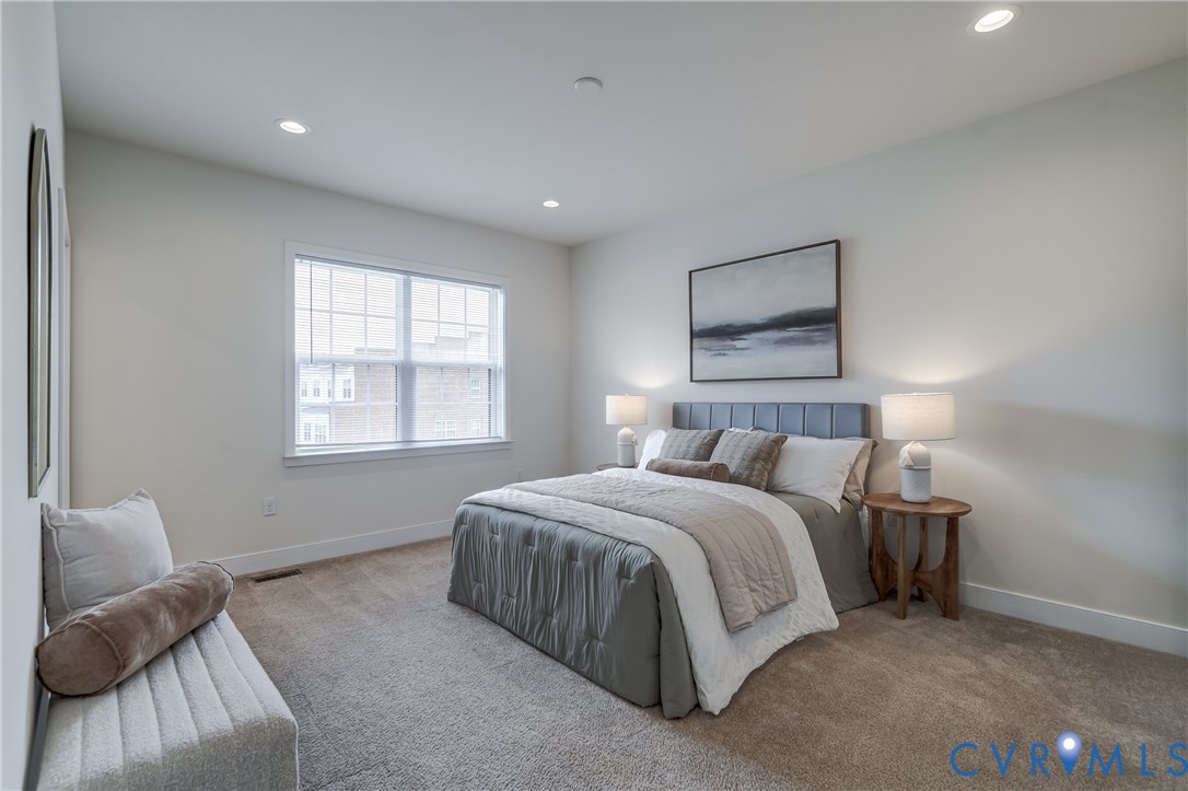 2006 Libbie Lake W Street, Unit B Richmond, VA 23230 - Photo 25 of 43 a spacious bedroom with a bed and window