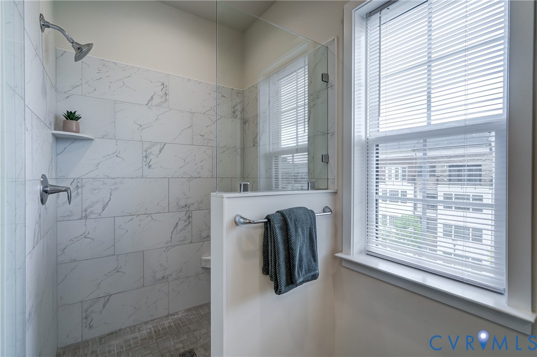 2006 Libbie Lake W Street, Unit B Richmond, VA 23230 - Photo 29 of 43 a bathroom with a bathtub and shower