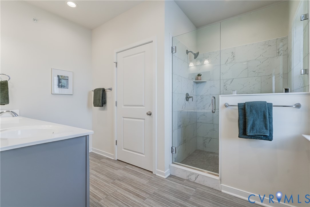 2006 Libbie Lake W Street, Unit B Richmond, VA 23230 - Photo 30 of 43 a bathroom with a sink and a mirror