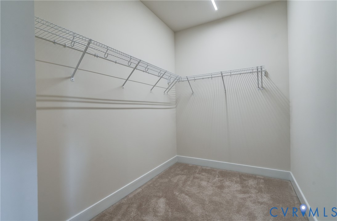 2006 Libbie Lake W Street, Unit B Richmond, VA 23230 - Photo 31 of 43 a view of a room with racks on the wall