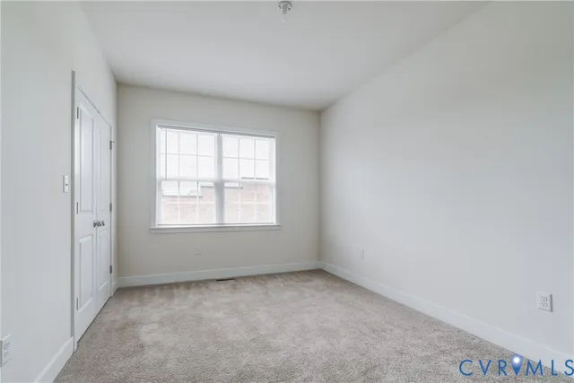 a bathroom with a sink a toilet and shower curtain