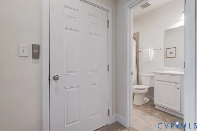 a view of a balcony with chair