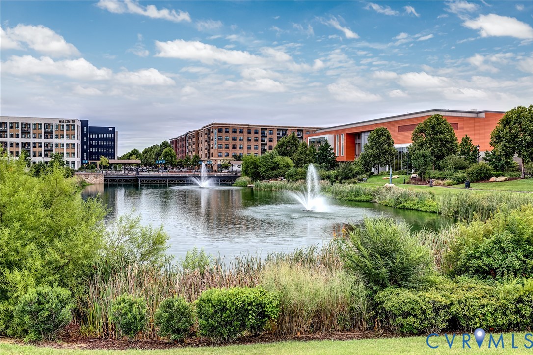 2006 Libbie Lake W Street, Unit B Richmond, VA 23230 - Photo 39 of 43 a view of a lake with a building in the background