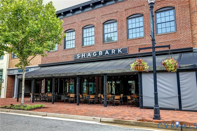 a view of a building with sitting area