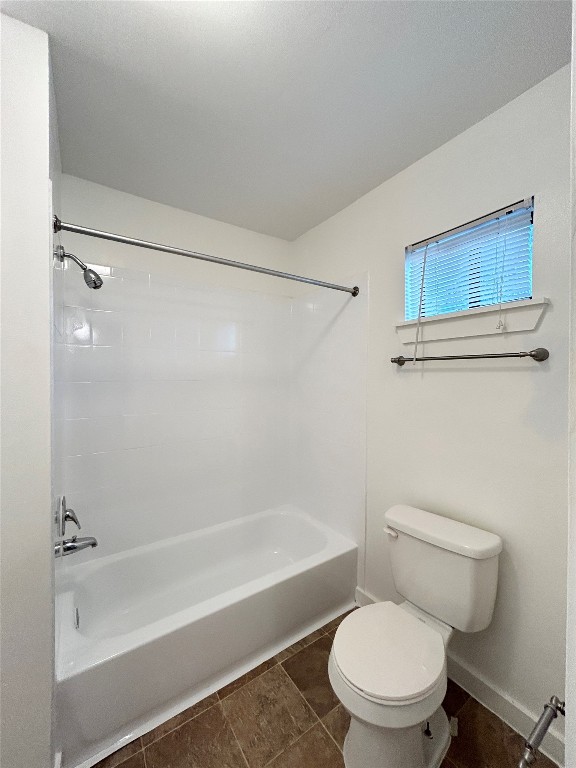 3629 North MacGregor Way, Unit 131 Houston, TX 77004 - Photo 13 of 13 a white toilet and tub sitting next to a bathroom sink