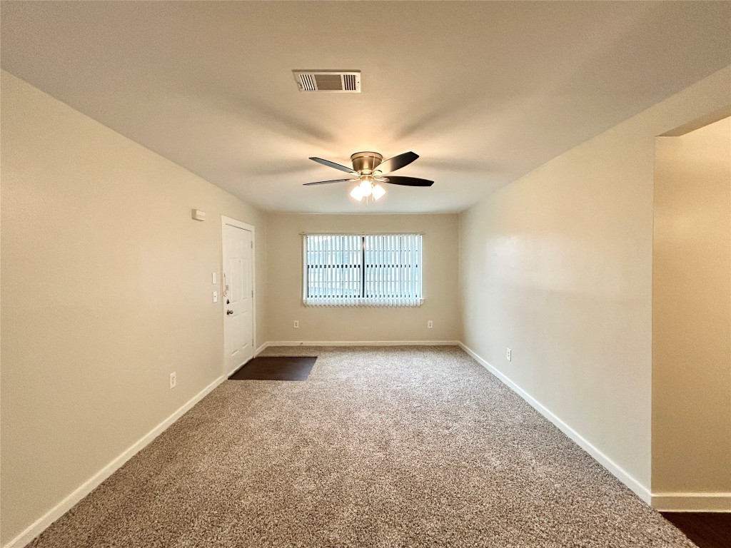 3629 North MacGregor Way, Unit 131 Houston, TX 77004 - Photo 4 of 13 a view of an empty room with a window