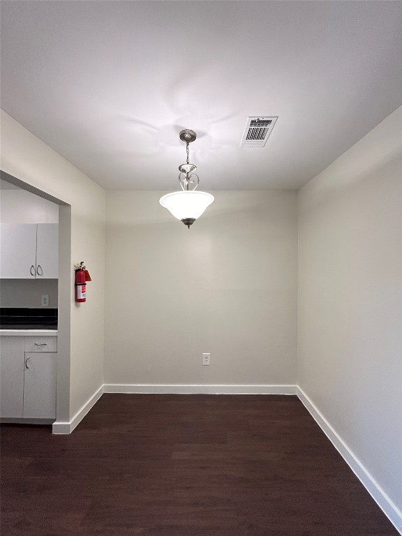 3629 North MacGregor Way, Unit 131 Houston, TX 77004 - Photo 6 of 13 a view of empty room with wooden floor