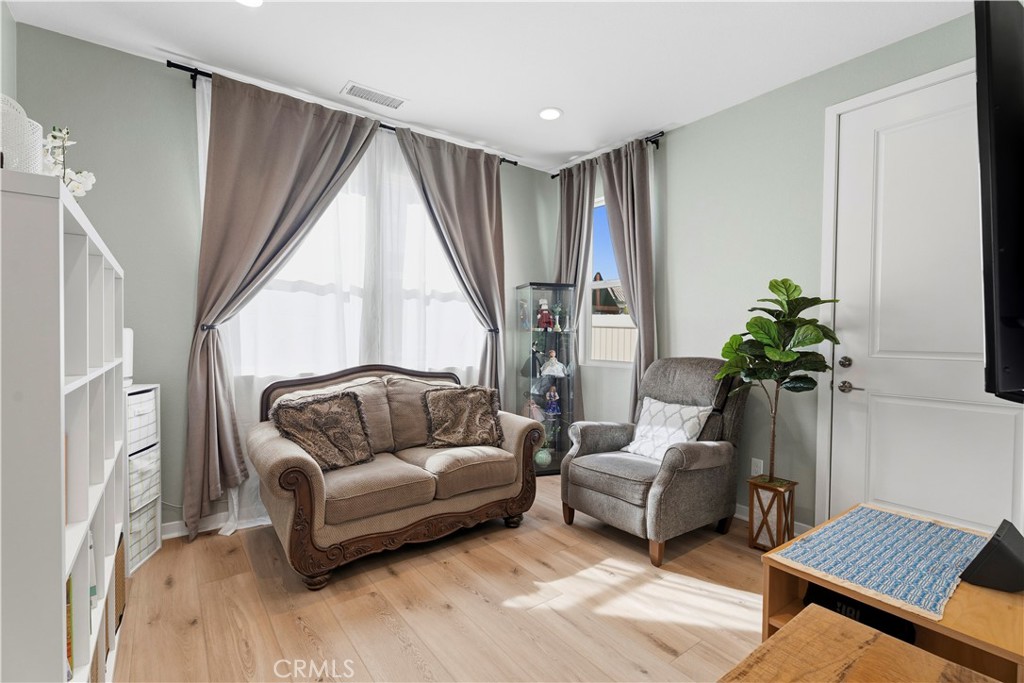 18100 Tableau Way Saugus, CA 91350 - Photo 22 of 63 a living room with furniture and a window