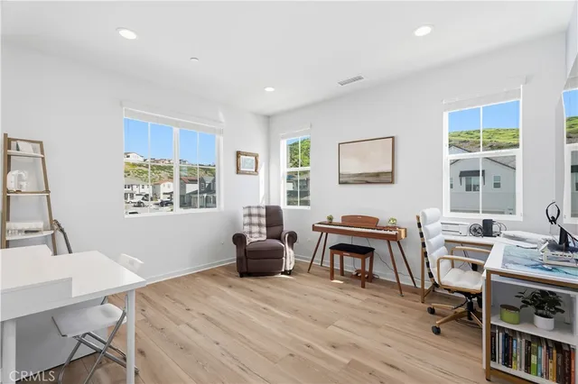 a bathroom with a double vanity sink toilet and shower