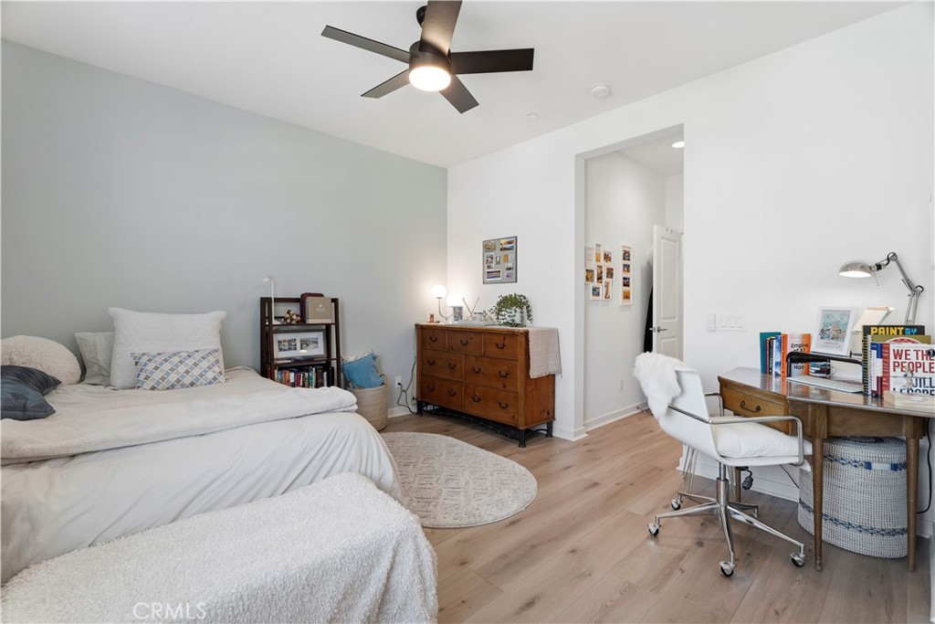 18100 Tableau Way Saugus, CA 91350 - Photo 39 of 63 a bedroom with a bed a desk and chair