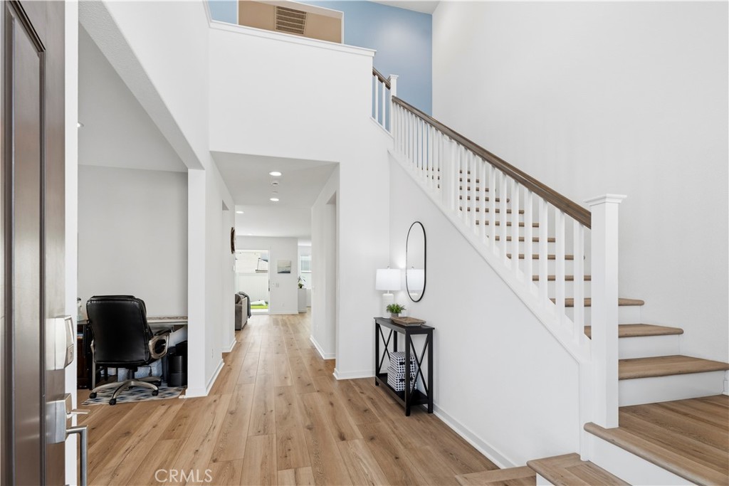 18100 Tableau Way Saugus, CA 91350 - Photo 4 of 63 a view of entryway and hall with wooden floor