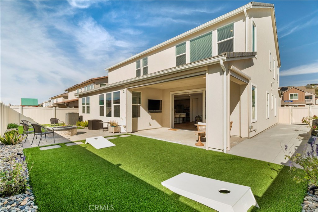 18100 Tableau Way Saugus, CA 91350 - Photo 41 of 63 a view of a house with a backyard