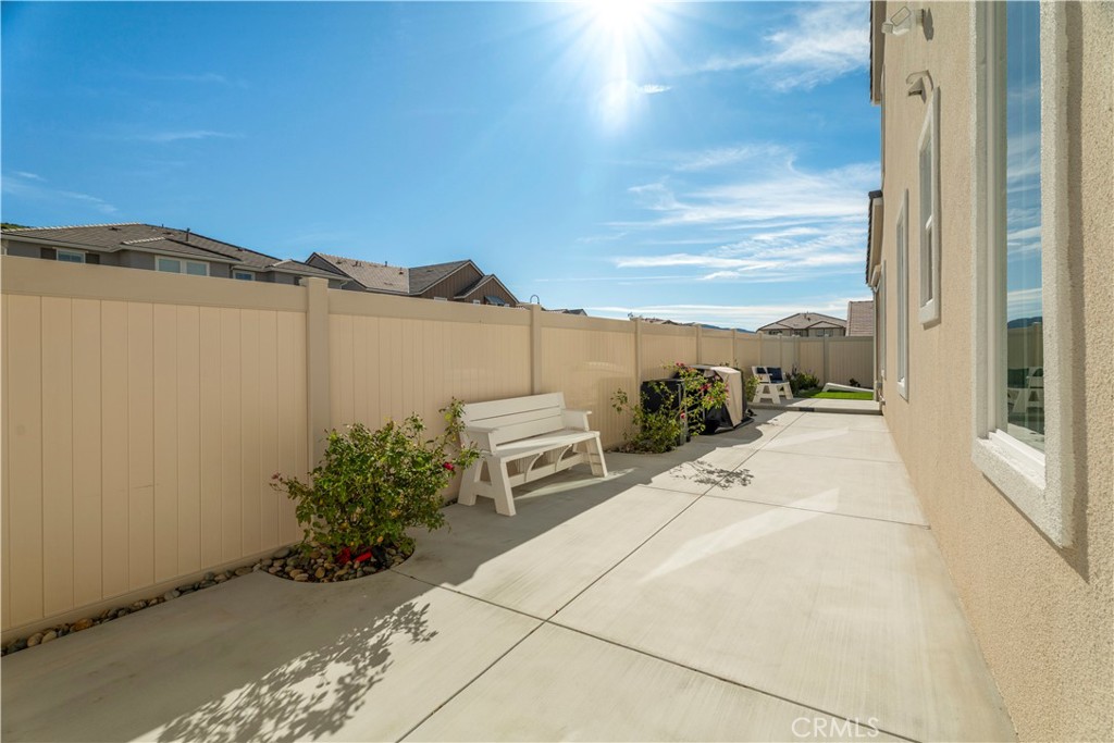 18100 Tableau Way Saugus, CA 91350 - Photo 44 of 63 a view of a terrace with a bench