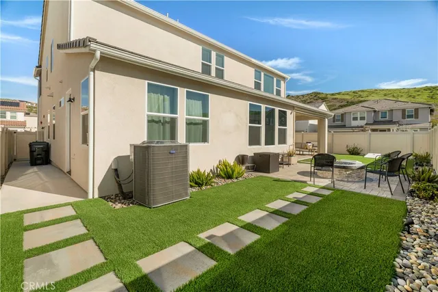 a view of outdoor space with palm trees