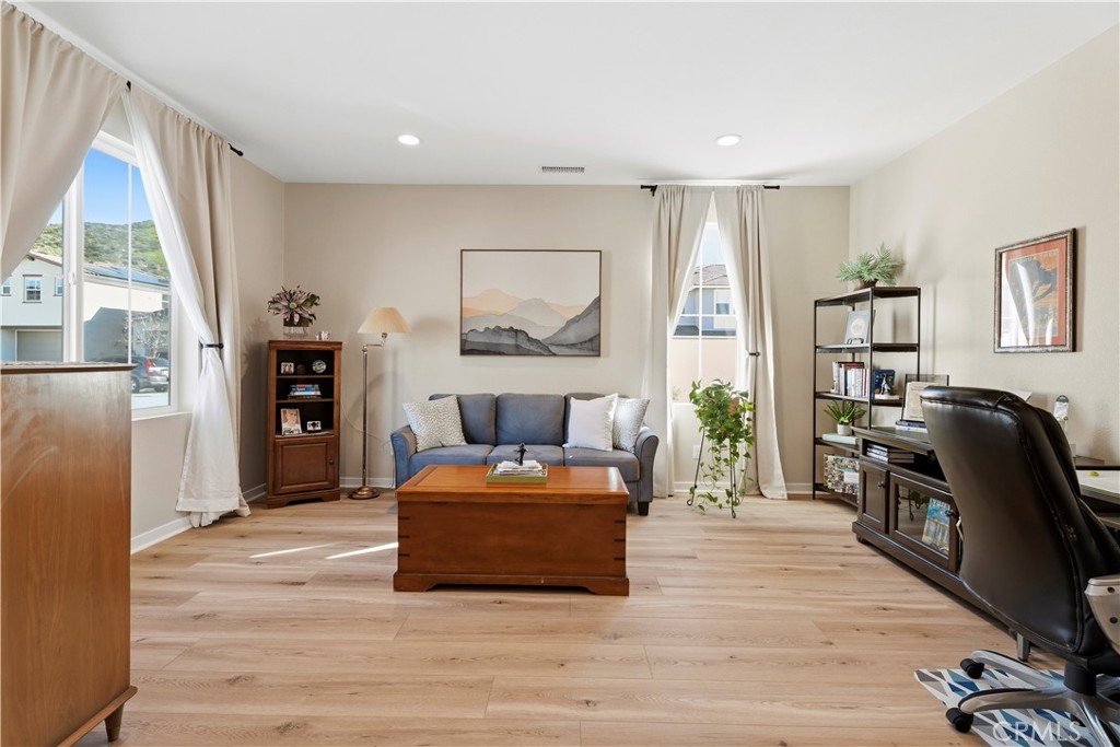 18100 Tableau Way Saugus, CA 91350 - Photo 5 of 63 a living room with furniture and a large window