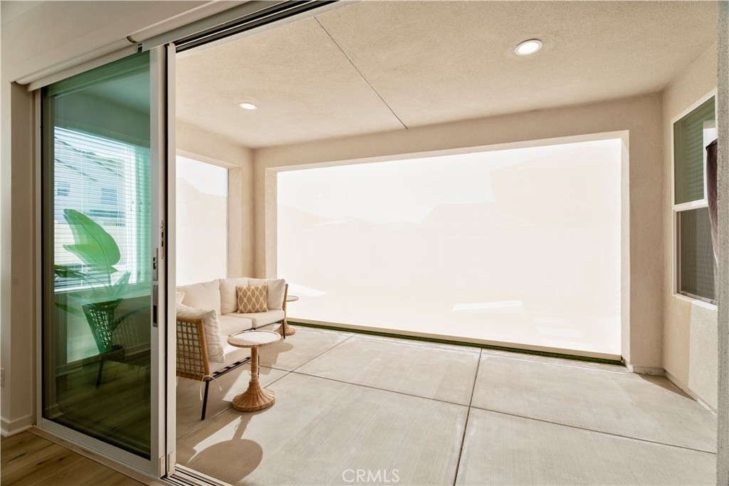 18100 Tableau Way Saugus, CA 91350 - Photo 10 of 63 a room with sliding glass door
