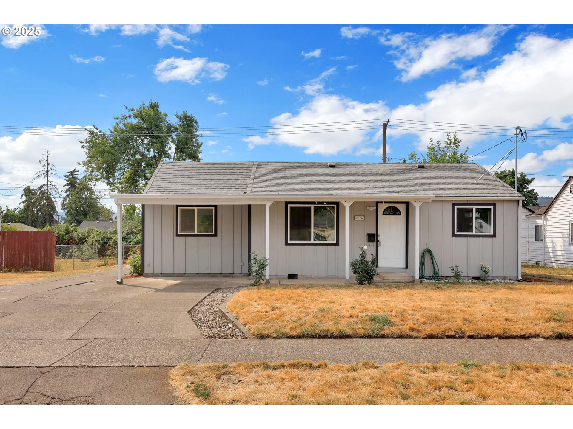 2665 E Street Springfield, OR 97477 - Photo 2 of 37 a view of a backyard of the house