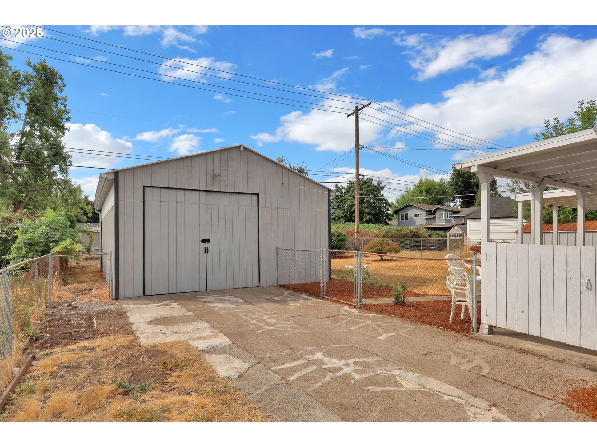 2665 E Street Springfield, OR 97477 - Photo 4 of 37 a view of a house with a patio