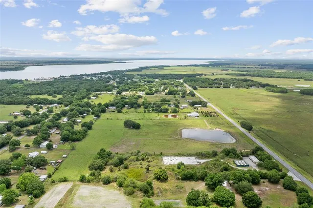 a view of swimming pool from a lake view
