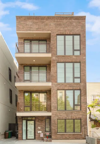 a bathroom with a sink toilet and mirror