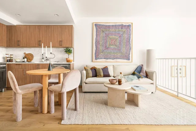 a kitchen with stainless steel appliances granite countertop a refrigerator sink and stove