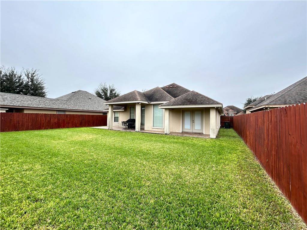 2111 Solar Drive Mission, TX 78574 - Photo 19 of 20 a front view of a house with garden