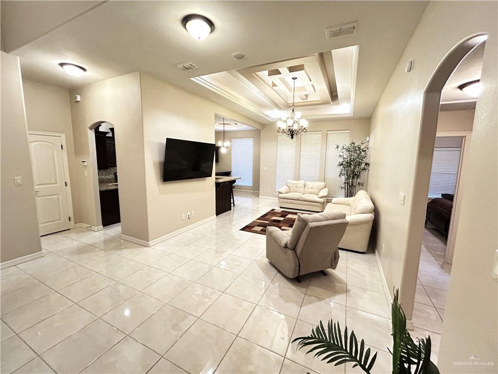 2111 Solar Drive Mission, TX 78574 - Photo 3 of 20 a living room with furniture and a flat screen tv