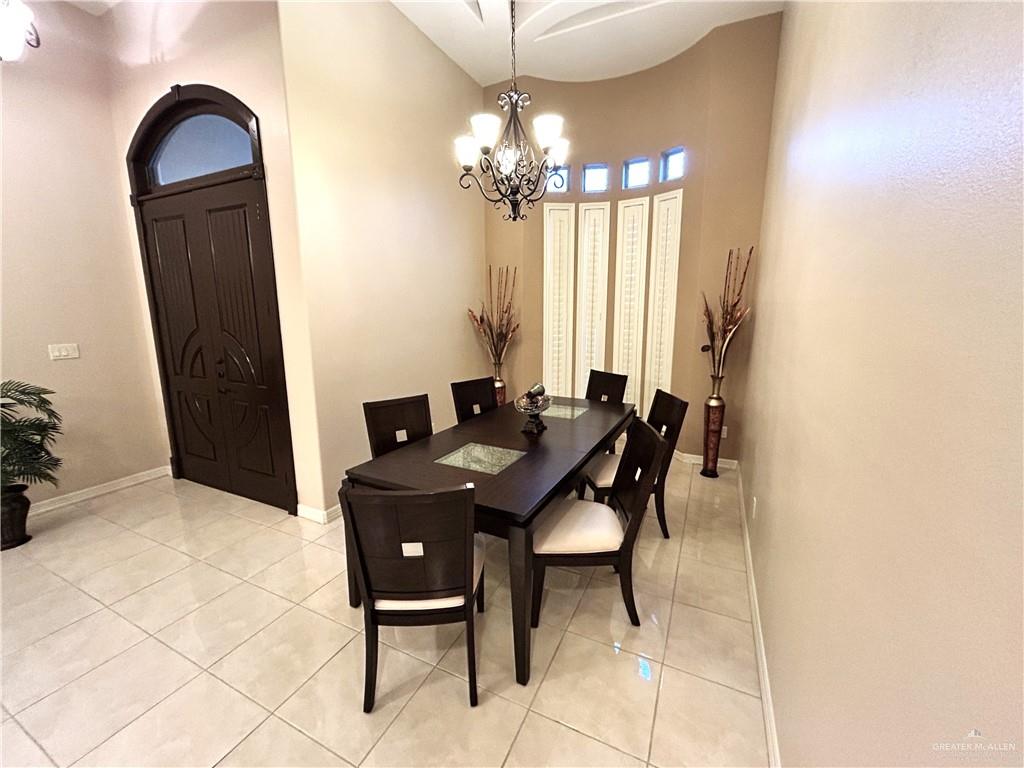 2111 Solar Drive Mission, TX 78574 - Photo 4 of 20 a dining room with furniture and chandelier kitchen view