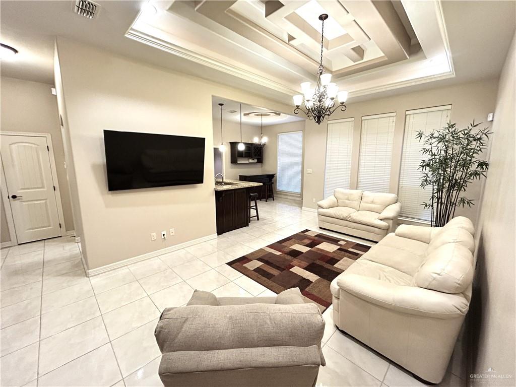 2111 Solar Drive Mission, TX 78574 - Photo 6 of 20 a living room with furniture and a flat screen tv