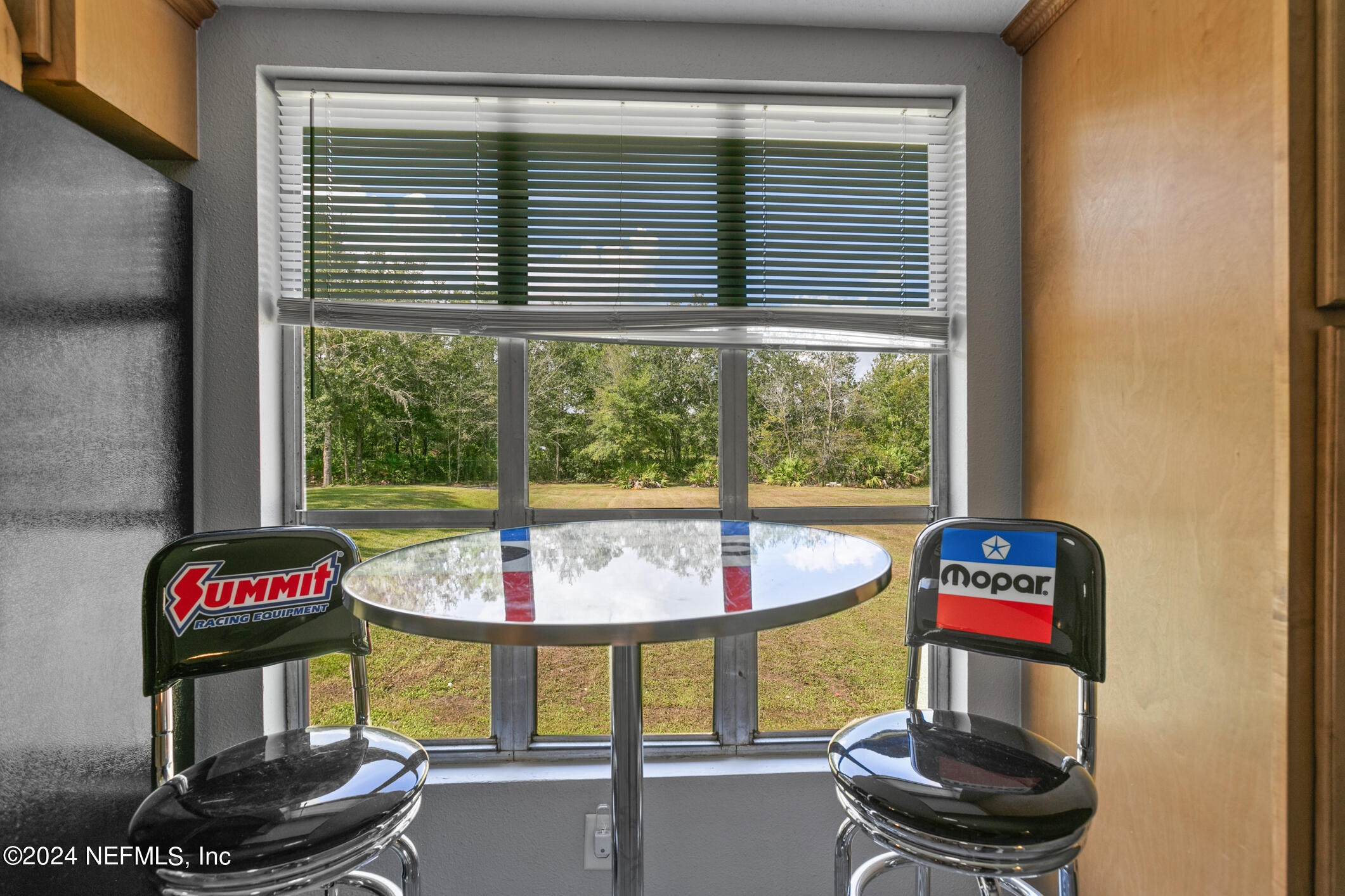 1151 Carter Road Lawtey, FL 32058 - Photo 16 of 47 a front view of a house with garden and patio