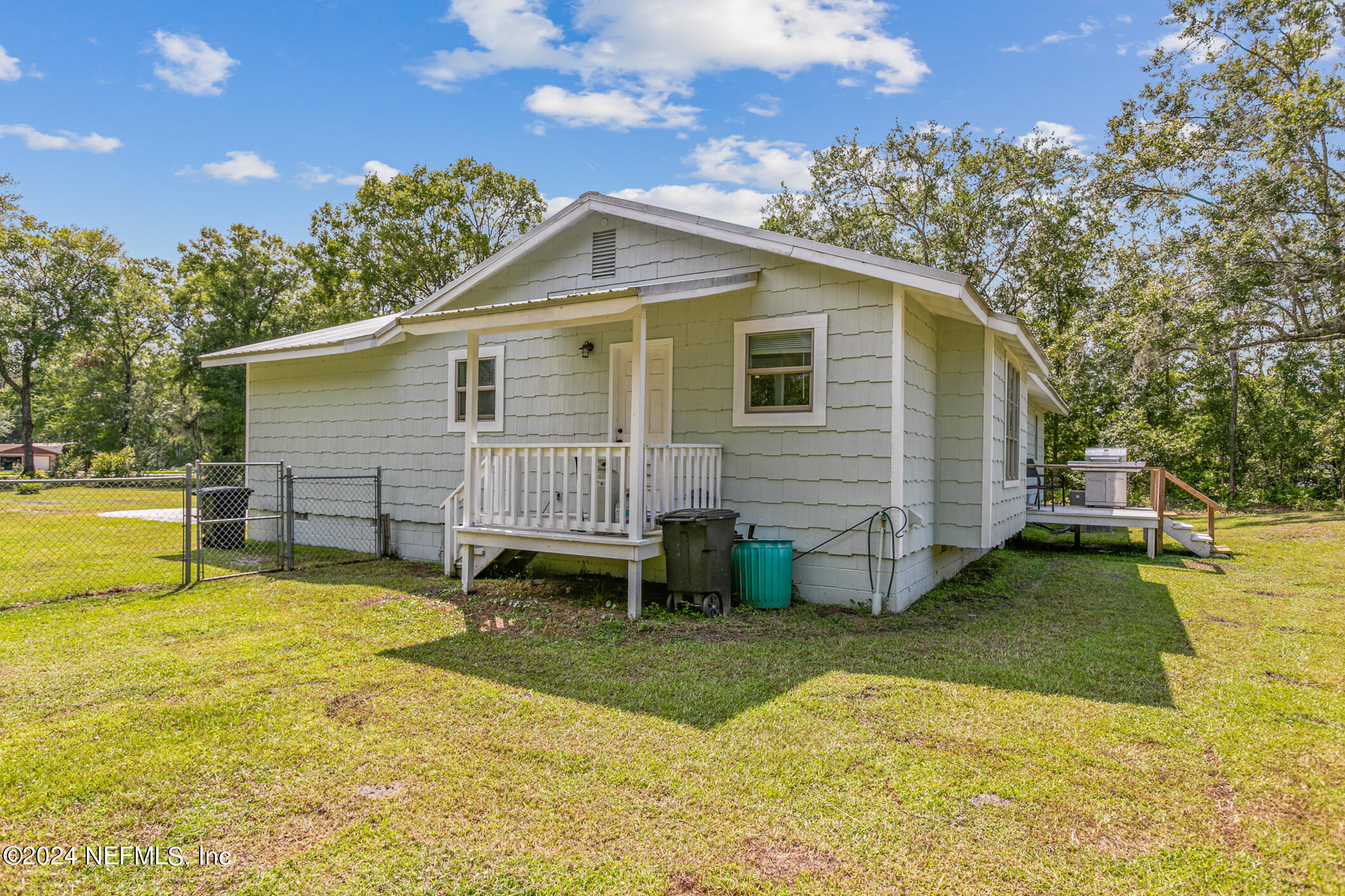 1151 Carter Road Lawtey, FL 32058 - Photo 30 of 47 a view of a house with a yard