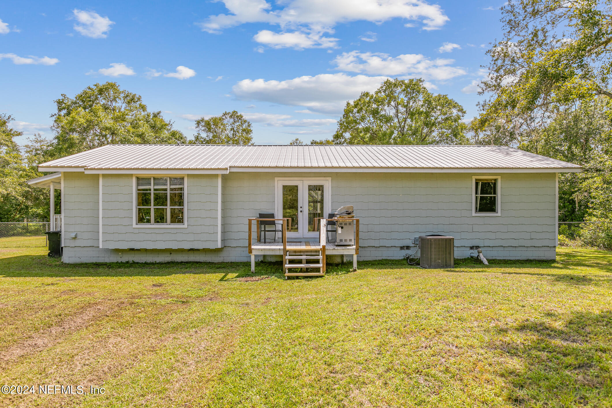 1151 Carter Road Lawtey, FL 32058 - Photo 31 of 47 a view of a house with a patio