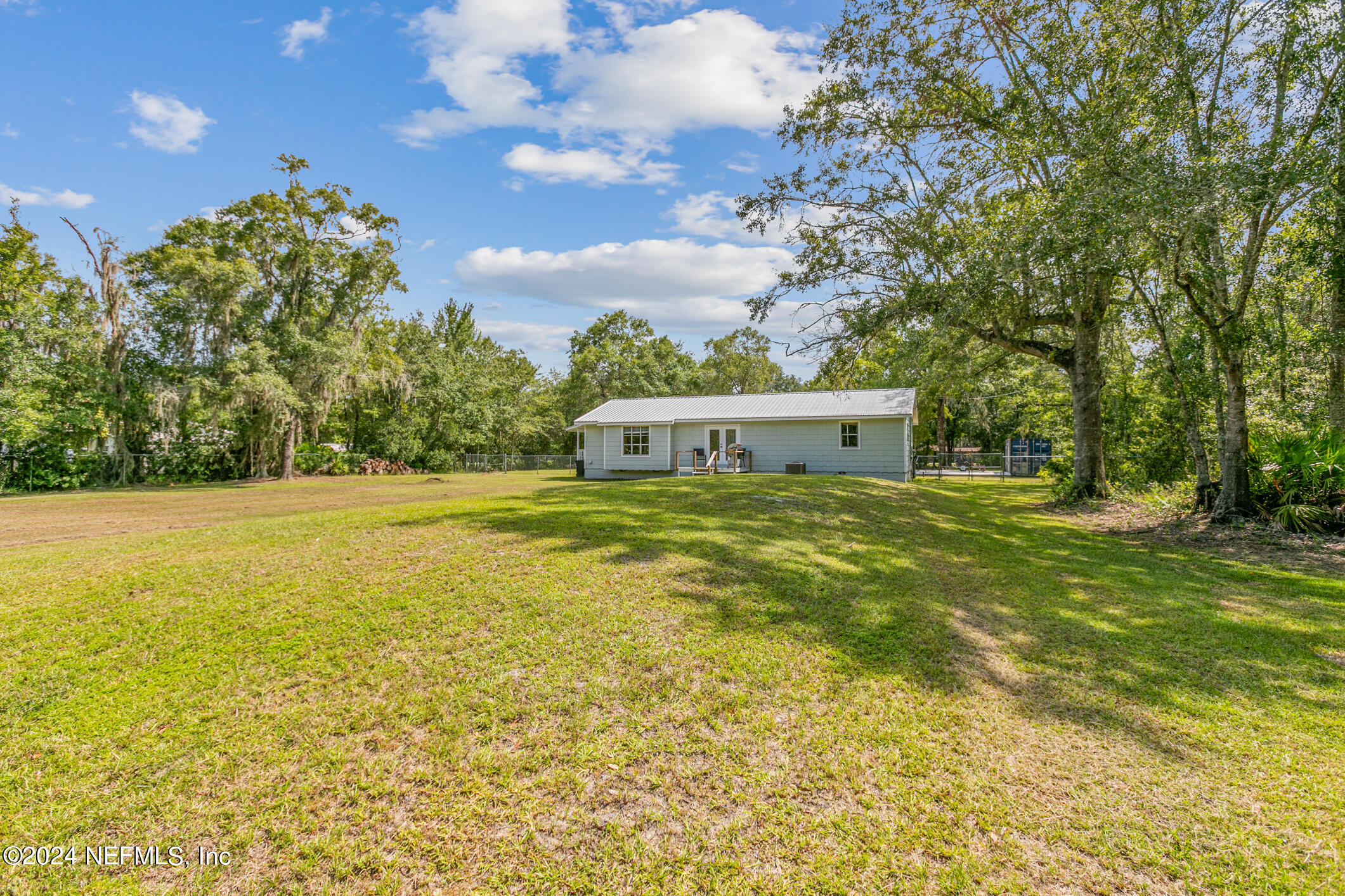 1151 Carter Road Lawtey, FL 32058 - Photo 36 of 47 a view of a house with a yard