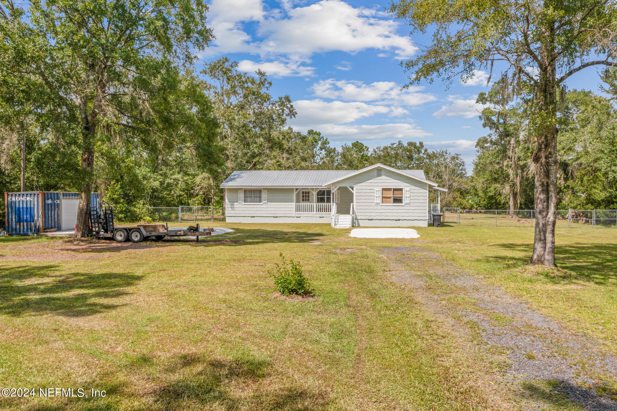 1151 Carter Road Lawtey, FL 32058 - Photo 40 of 47 a view of a house with a swimming pool