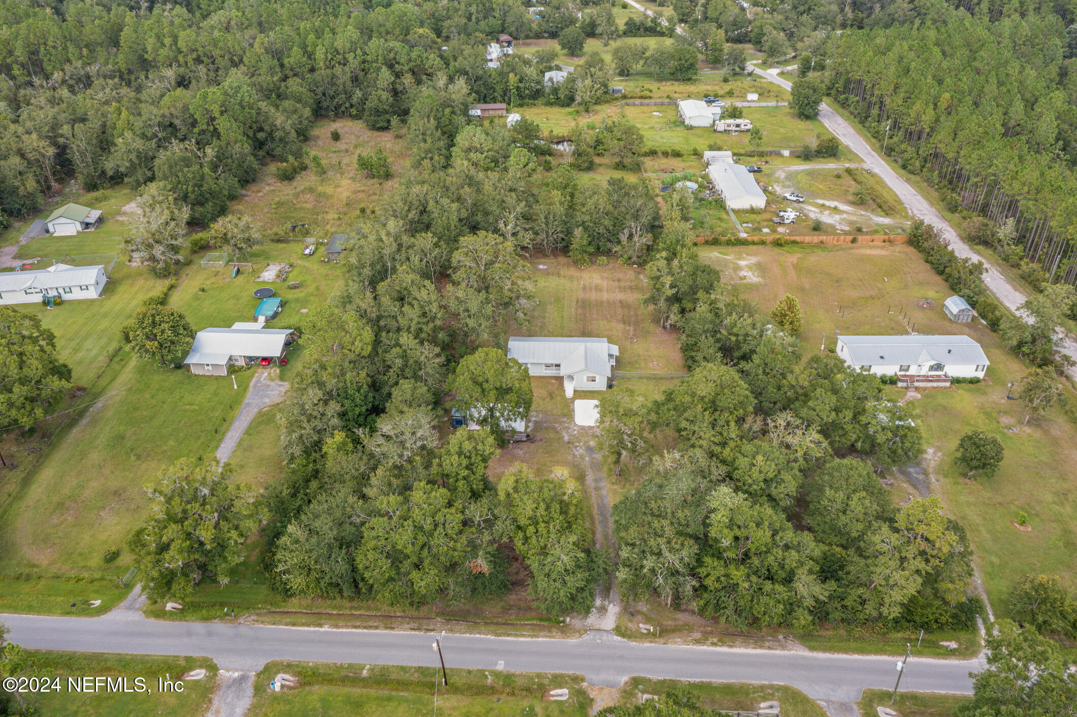 1151 Carter Road Lawtey, FL 32058 - Photo 42 of 47 an aerial view of residential houses with outdoor space