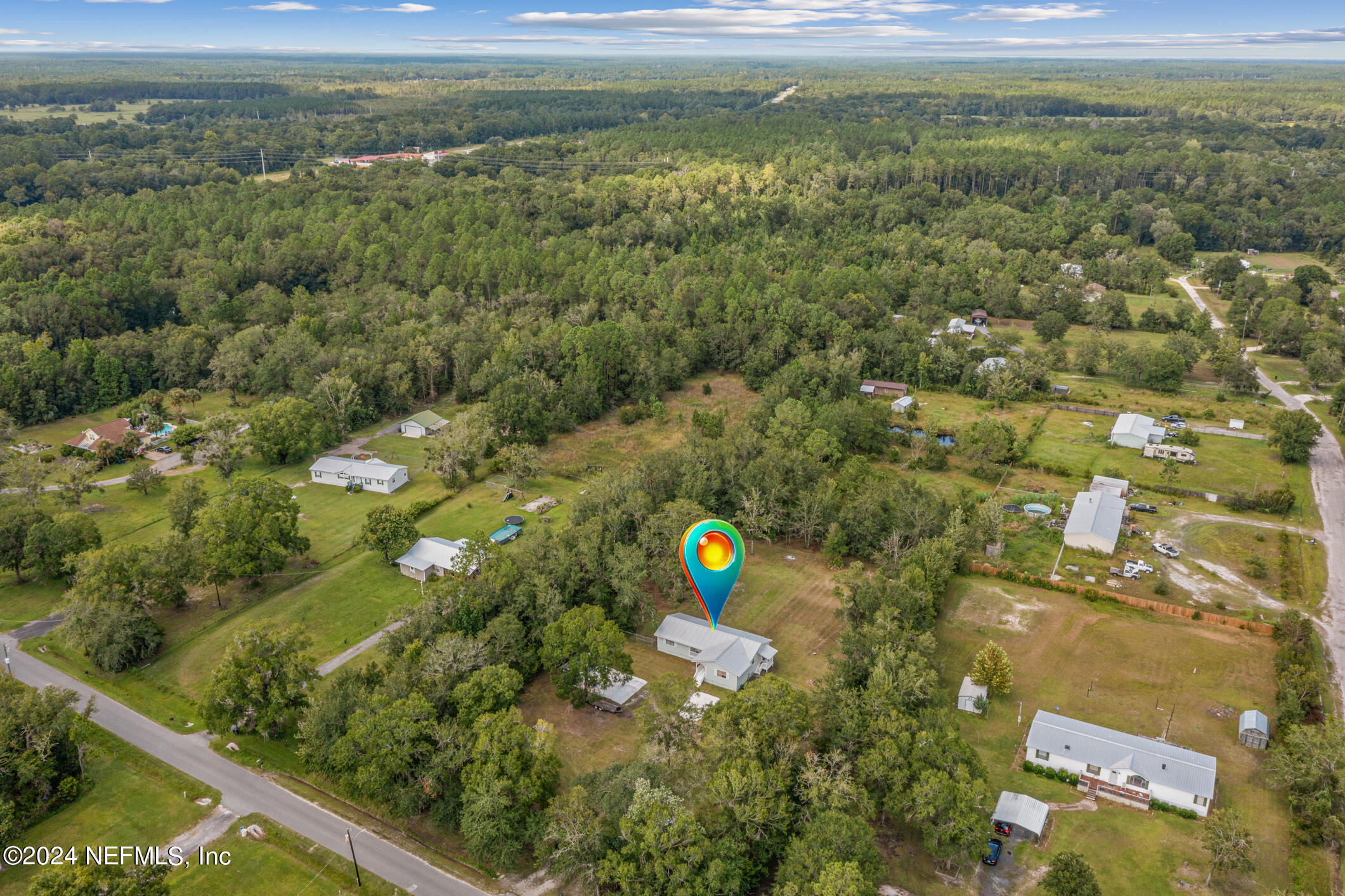 1151 Carter Road Lawtey, FL 32058 - Photo 43 of 47 a view of a green yard with large trees