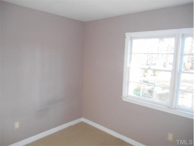 3713 Randell Road Garner, NC 27529 - Photo 8 of 8 an empty room with a window