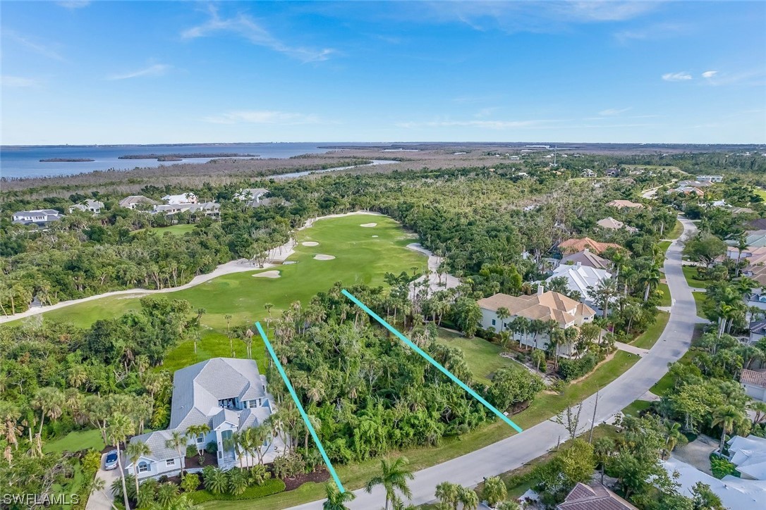 2438 Wulfert Road Sanibel, FL 33957 - Photo 16 of 21 an aerial view of multiple house