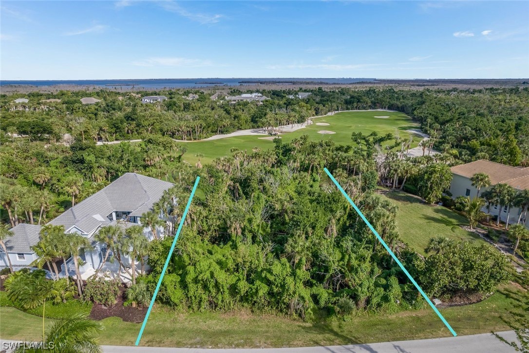 2438 Wulfert Road Sanibel, FL 33957 - Photo 17 of 21 a view of a yard with a garden
