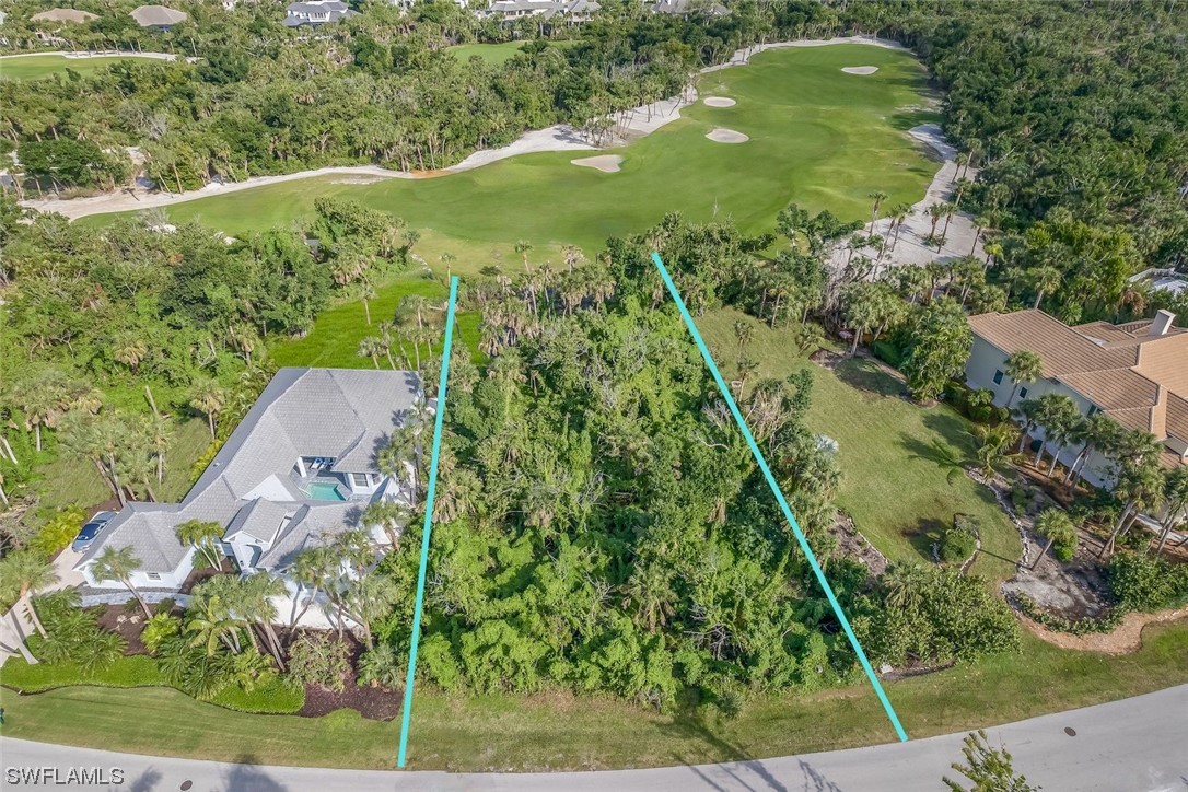 2438 Wulfert Road Sanibel, FL 33957 - Photo 10 of 21 an aerial view of a residential houses with outdoor space and trees