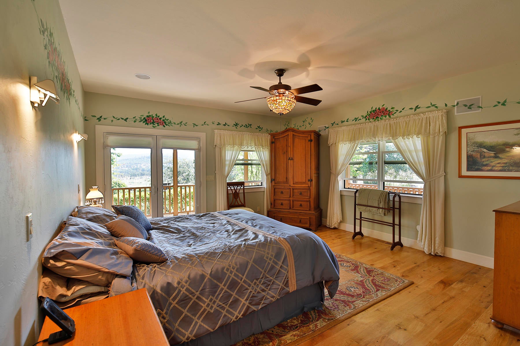 1524 Dry Creek Road Eagle Point, OR 97524 - Photo 20 of 50 Primary bedroom with double doors to out side.