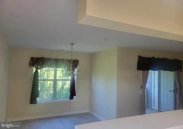 a view of a livingroom with a window