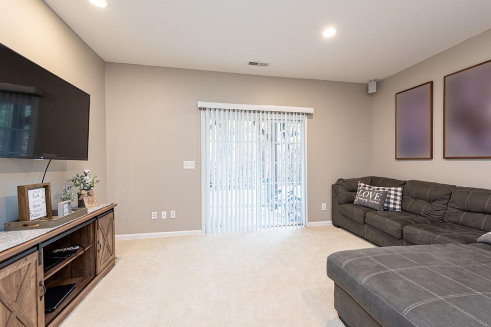 8451 Reedy Ridge Lane Raleigh, NC 27613 - Photo 19 of 30 Lower Level Bonus Room. Could be used as a Flex/Office/Fitness/Craft Room. Bonus Room